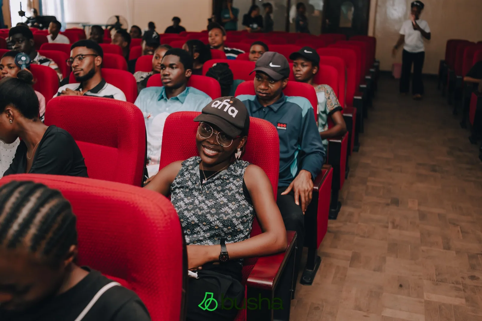 Community members meeting at a Busha event