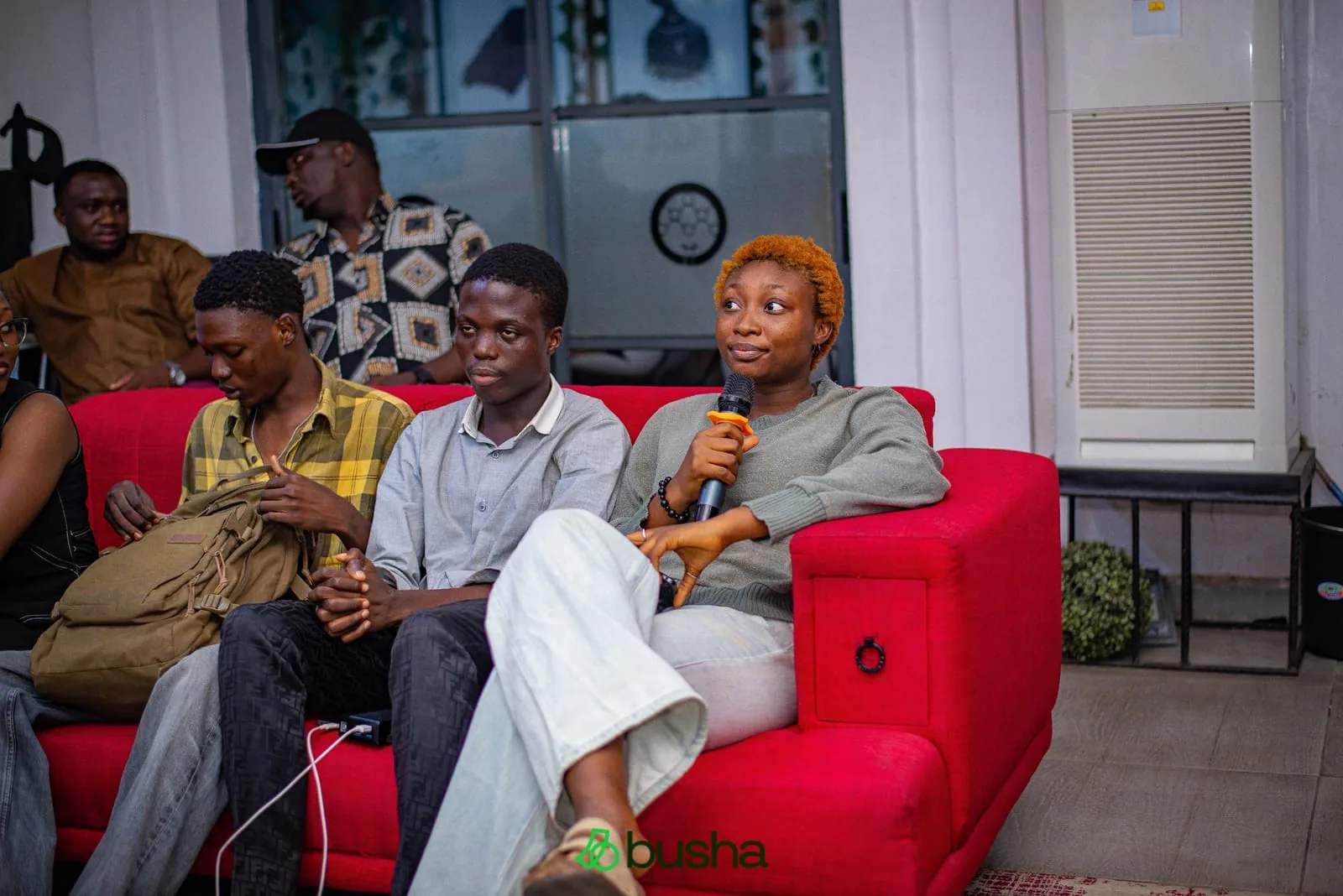 Students learning together at a Busha event